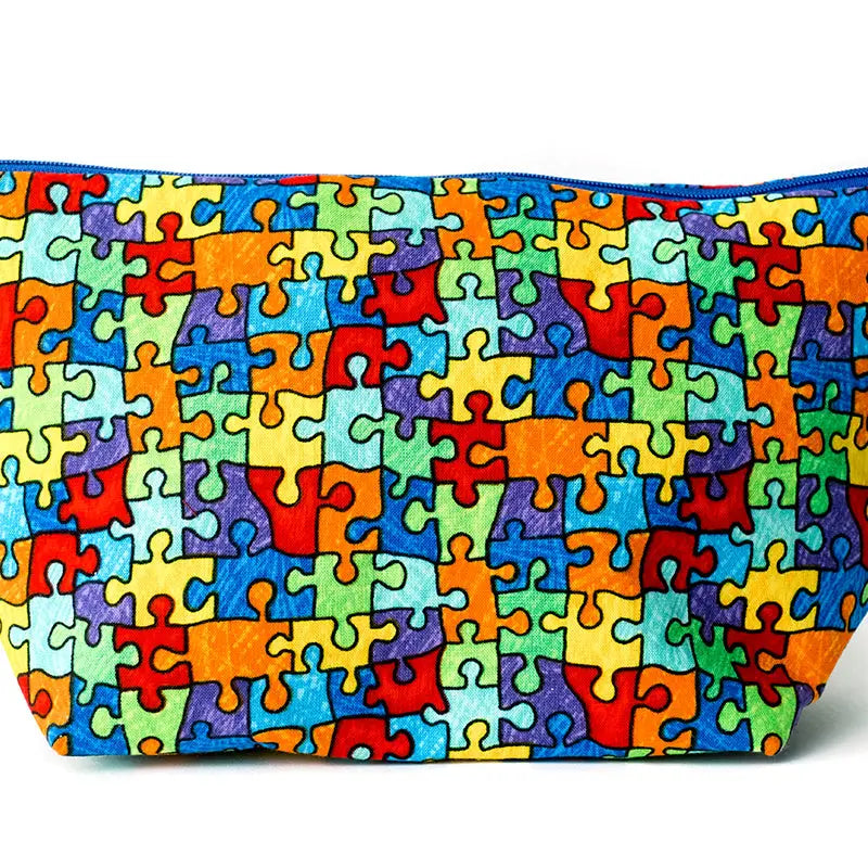 Carry love, awareness, and purpose with our handmade Autism Awareness fabric cosmetic bag. 🌈🧩