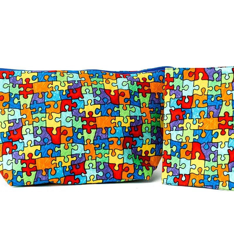 Carry love, awareness, and purpose with our handmade Autism Awareness fabric cosmetic bag. 🌈🧩